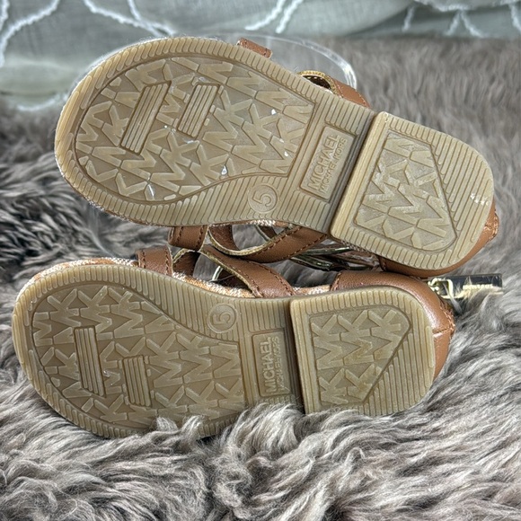 (S4)Michael Kors Toddler Sandals, Size 5c
Brown, Silver, Gold
Back zip gladiator - Picture 6 of 12